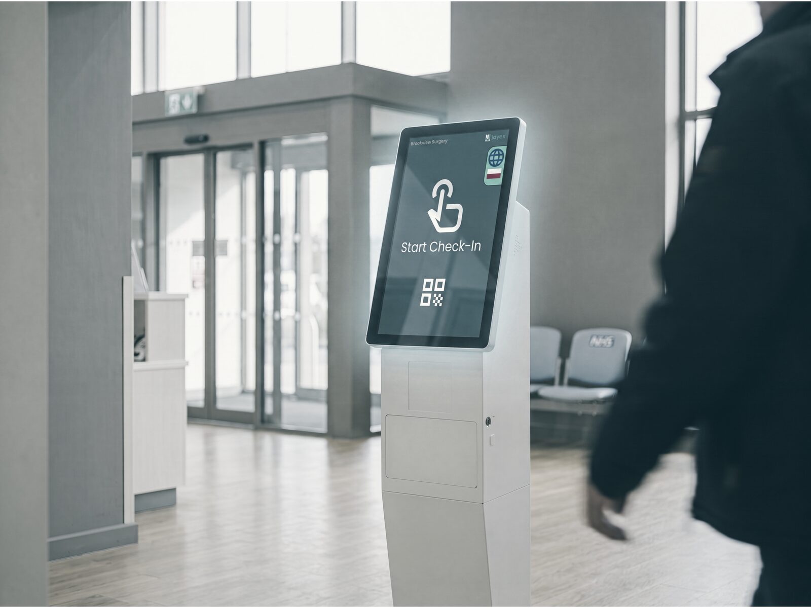 Illustration of a touchscreen check-in kiosk in a GP surgery entrance